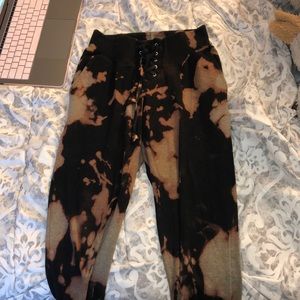Bleached tie-dyed black joggers